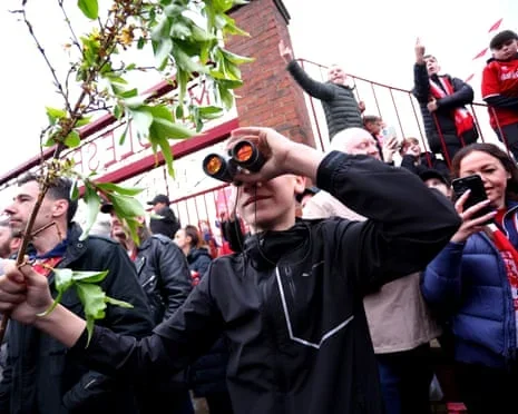 Middlesbrough fans with binoculars make fun of the spying controversy