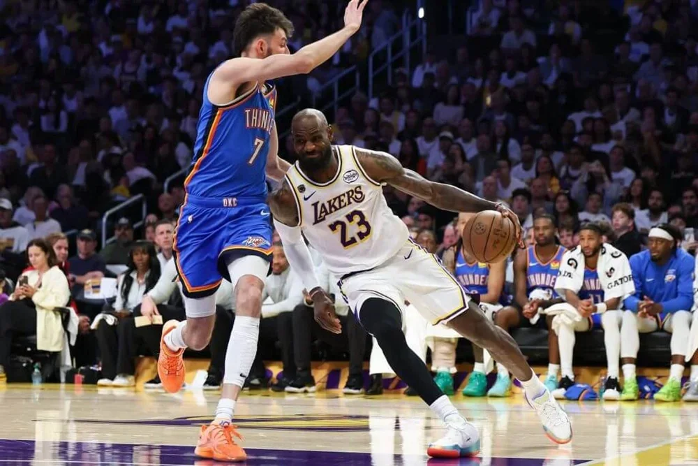 LeBron James drives against Chet Holmgren